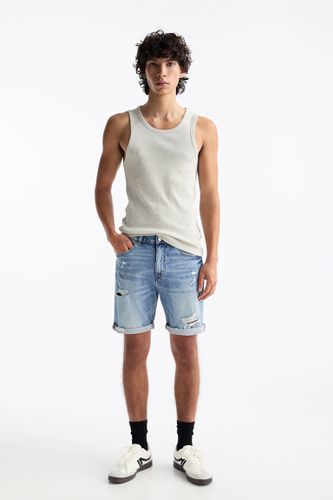 Bermuda En Jean Slim Déchiré - Pull&Bear - Modalova