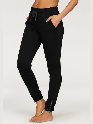 Pantalon détente avec jambes étroites - Bench. Loungewear - Modalova