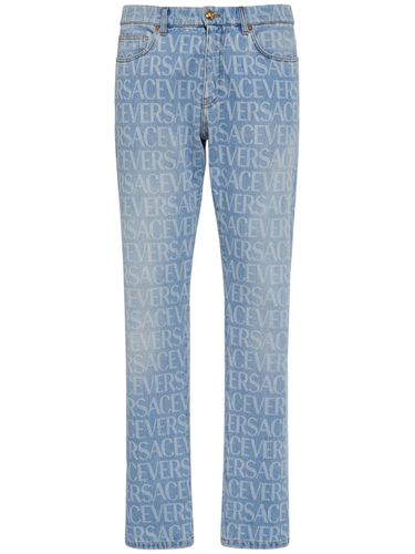 Jean En Denim De Coton À Monogramme - VERSACE - Modalova