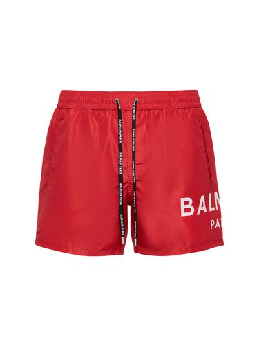 Short De Bain En Nylon Stretch Imprimé Logo - BALMAIN - Modalova