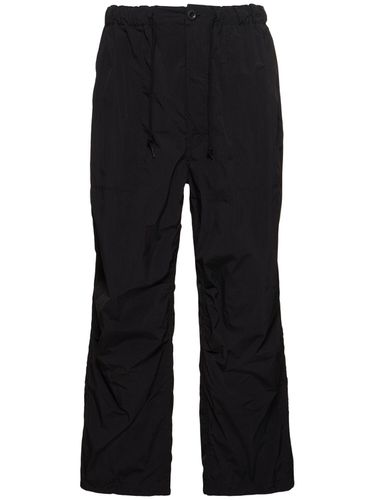 Pantalon En Nylon Typewriter - COMME DES GARÇONS HOMME - Modalova