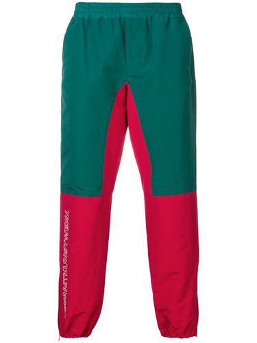 Pantalon de jogging bicolore - JohnUNDERCOVER - Modalova