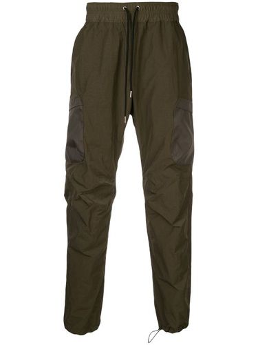 Pantalon de jogging à poches cargo - John Elliott - Modalova