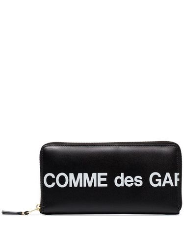 Portefeuille continental à logo imprimé - Comme Des Garçons Wallet - Modalova