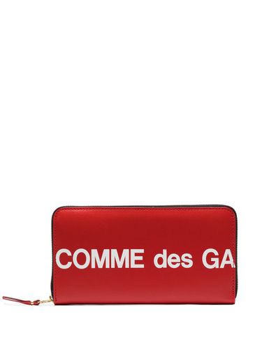 Portefeuille continental à logo imprimé - Comme Des Garçons Wallet - Modalova