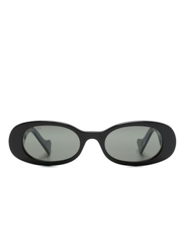 Lunettes de soleil GG à monture ovale - Gucci Eyewear - Modalova