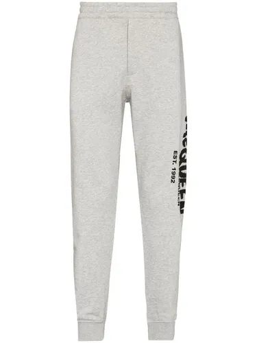 Pantalon de jogging à imprimé graffiti - Alexander McQueen - Modalova