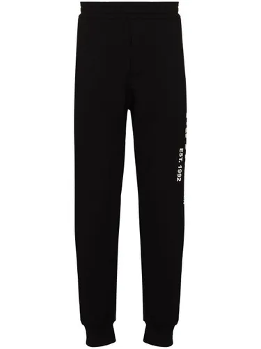 Pantalon de jogging à imprimé graffiti - Alexander McQueen - Modalova