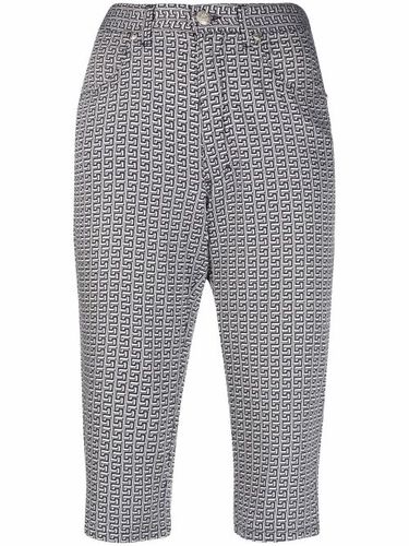 Pantalon court à imprimé Greca (années 1990) - Versace Pre-Owned - Modalova