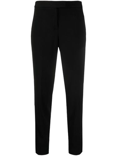 DKNY pantalon slim court - Noir - DKNY - Modalova