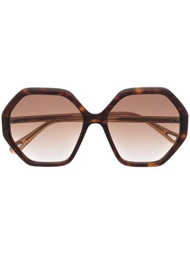 Lunettes de soleil à effet écaille de tortue - Chloé Eyewear - Modalova