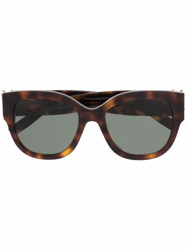 Lunettes de soleil à effet écaille de tortue - Saint Laurent Eyewear - Modalova