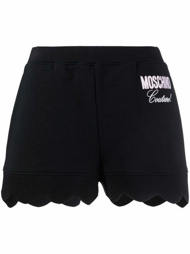 Short court à logo Couture brodé - Moschino - Modalova