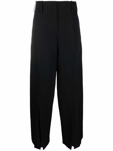 Pantalon ample à fentes - JW Anderson - Modalova