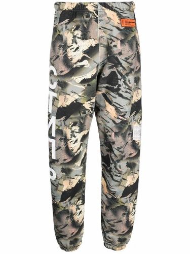 Pantalon de jogging СТИЛЬ à motif camouflage - Heron Preston - Modalova