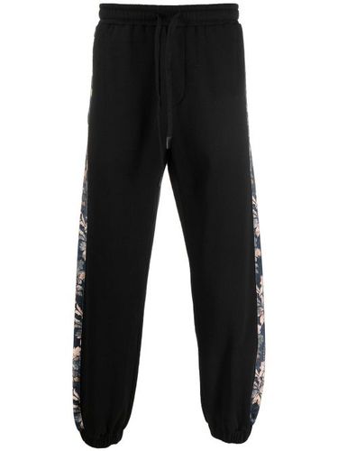 Pantalon de jogging à fleurs - Versace Jeans Couture - Modalova