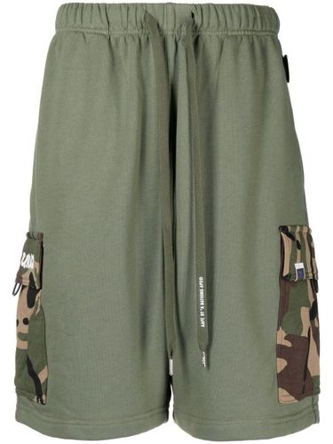 Short cargo Ape Head à motif camouflage - AAPE BY *A BATHING APE® - Modalova