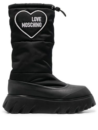 Bottes matelassées à patch cœur - Love Moschino - Modalova