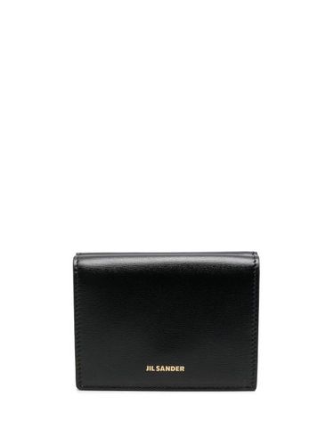 Portefeuille pliant en cuir - Jil Sander - Modalova