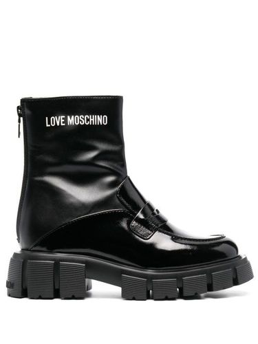 Bottines à logo imprimé - Love Moschino - Modalova