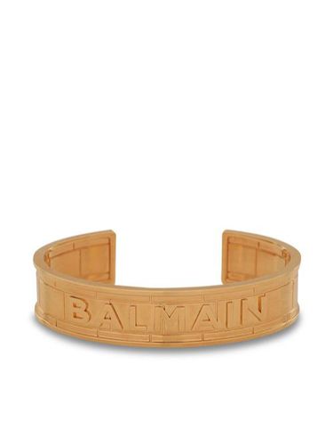 Bracelet manchette à logo embossé - Balmain - Modalova