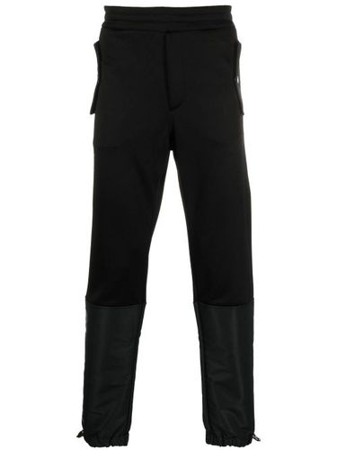 Pantalon de jogging fuselé à design à empiècements - Alexander McQueen - Modalova