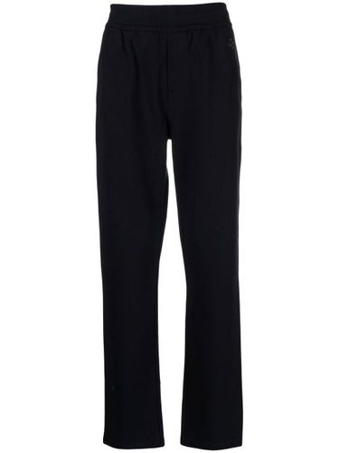 Pantalon à logo imprimé - Gucci - Modalova