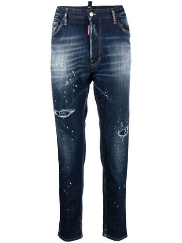 Jean skinny effet-usé à taches de peinture - DSQUARED2 - Modalova