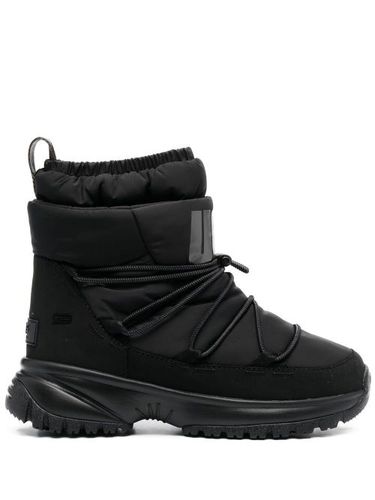 Bottines matelassées à logo imprimé - UGG - Modalova