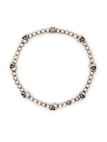 Bracelet de perles à breloques tête de mort - Alexander McQueen - Modalova