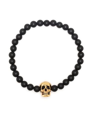 Bracelet chaîne à breloque tête de mort - Alexander McQueen - Modalova