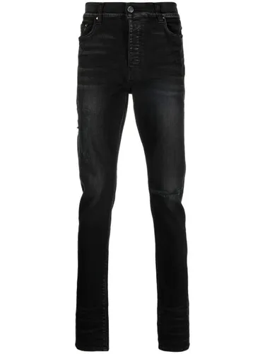 Jean skinny à logo brodé - AMIRI - Modalova