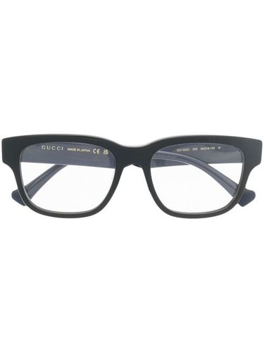 Lunettes de vue à monture carrée - Gucci Eyewear - Modalova