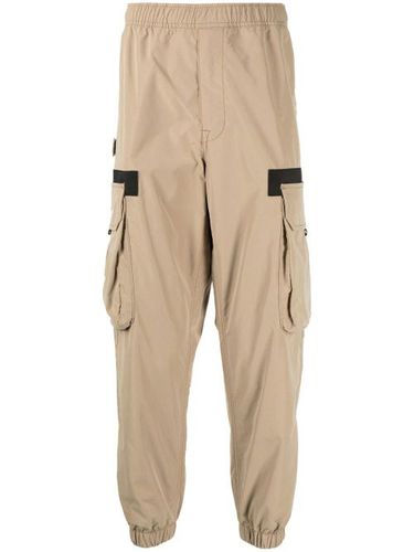 Pantalon fuselé à taille élastiquée - AAPE BY *A BATHING APE® - Modalova