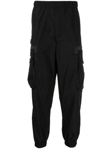 Pantalon fuselé à taille élastiquée - AAPE BY *A BATHING APE® - Modalova