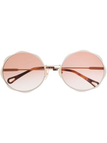 Lunettes de vue rondes à logo gravé - Chloé Eyewear - Modalova