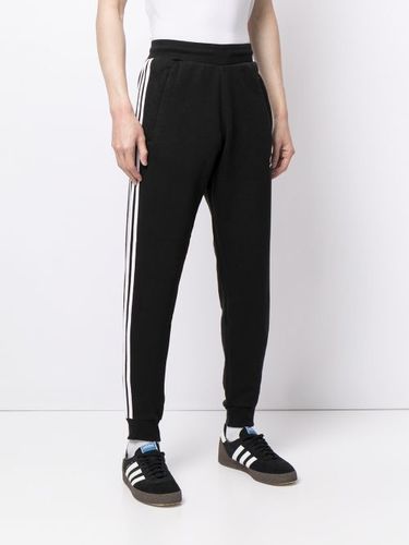 Pantalon de jogging à bandes latérales - adidas - Modalova