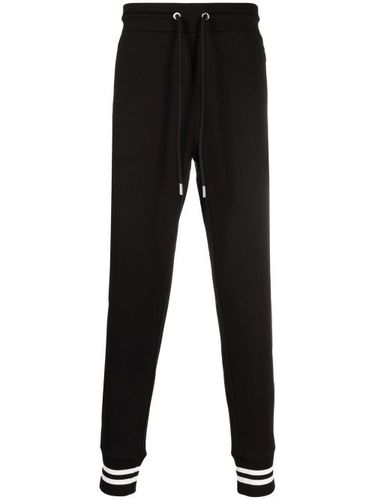 Pantalon de jogging fuselé à patch logo - Moncler - Modalova