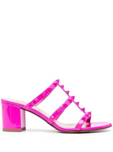 Mules en cuir à ornements Rockstud - Valentino Garavani - Modalova