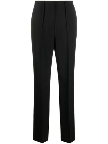 Pantalon de tailleur slim en laine vierge - FENDI - Modalova