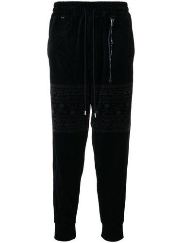 Pantalon de jogging en velours à logo - Mastermind World - Modalova