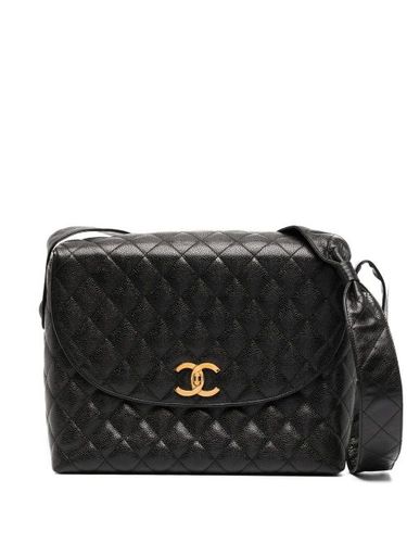 Sac porté épaule matelassé à loquet (1992) - CHANEL Pre-Owned - Modalova