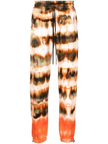 Pantalon de jogging à imprimé tie-dye - AMIRI - Modalova