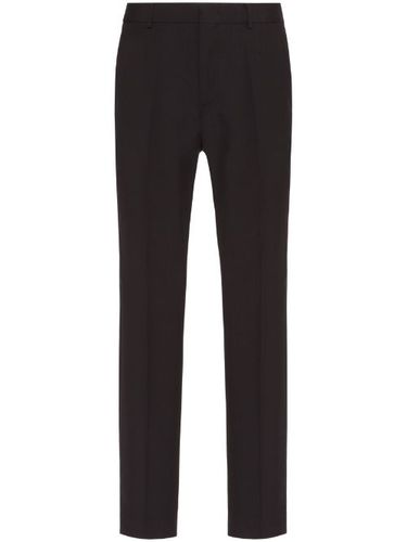 Pantalon de costume slim en laine vierge - Valentino Garavani - Modalova