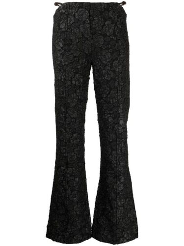 Pantalon en jacquard à coupe évasée - GANNI - Modalova