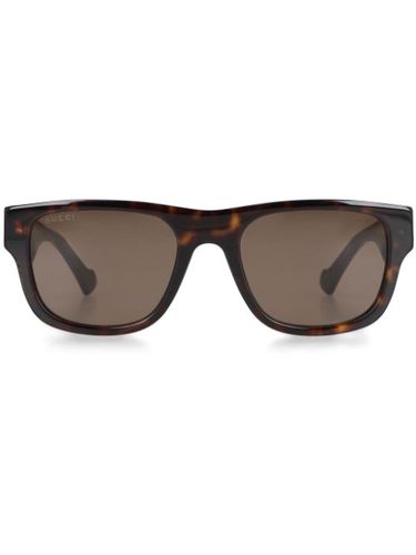 Lunettes de soleil carrées à logo imprimé - Gucci Eyewear - Modalova