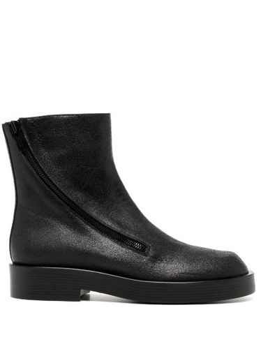 Bottines en cuir à fermeture zippée - Ann Demeulemeester - Modalova