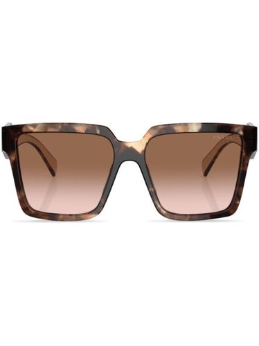 Lunettes de soleil à effet écaille de tortue - Prada Eyewear - Modalova