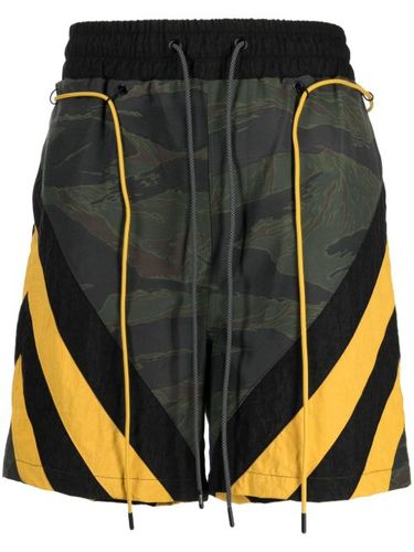 Short de sport rayé à motif camouflage - Mostly Heard Rarely Seen - Modalova