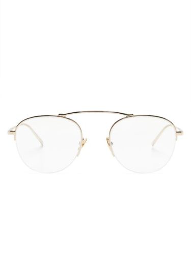 Lunettes de vue rondes à logo gravé - Saint Laurent Eyewear - Modalova